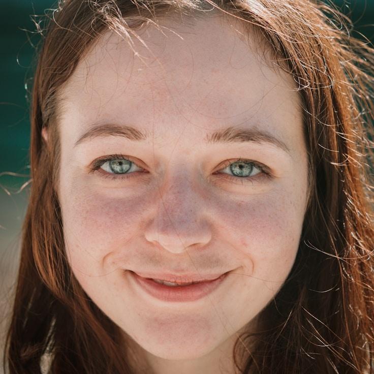 Kaveri Mehta, Lead Design Curator at DewPulseEmber, reviewing corporate floral arrangements